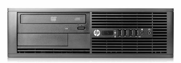 Три компьютера и два монитора от HP. Фото